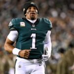 Jalen Hurts in his Eagles uniform on the field at Lincoln Financial Field